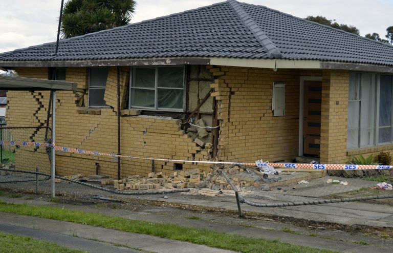 Car collides with house in Churchill