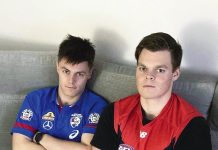 Brothers are on opposite sides of the fence