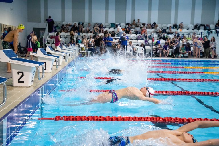 The region’s swimmers make a splash in return