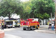 Crews attend to smoke and flames in Moe CBD