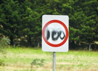 Speed limits questioned, signs damaged